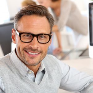 Portrait of smiling businessman with eyeglasses